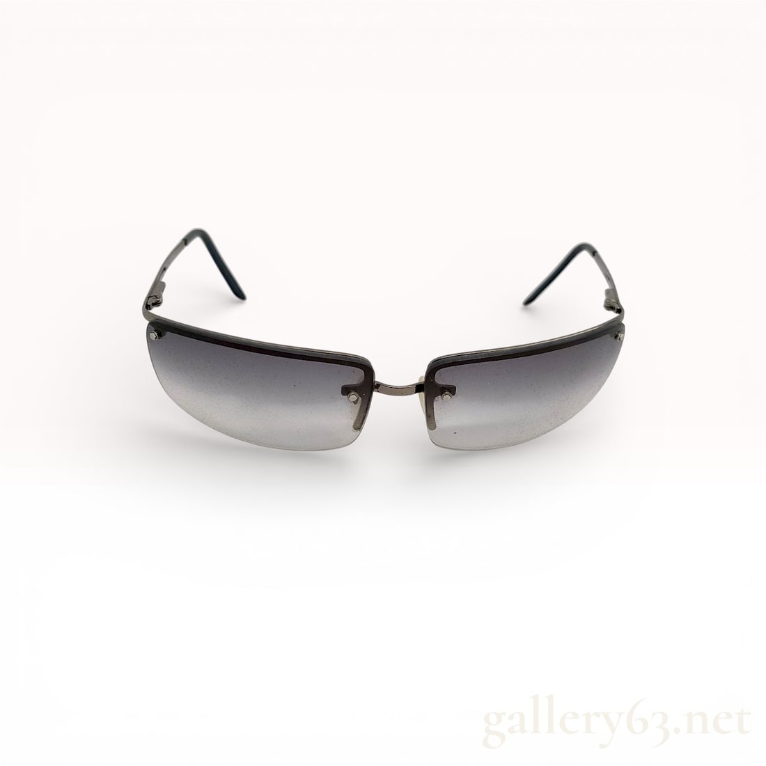 Fendi SL 7340 Semi-Rimless Wrap-Around Sunglasses: Fendi model SL 7340 wrap-around sunglasses, late 20th or early 21st century. Gunmetal-tone metal frame with a semi-rimless design, gray gradient lenses, and adjustable nose pads. Interior temples mark