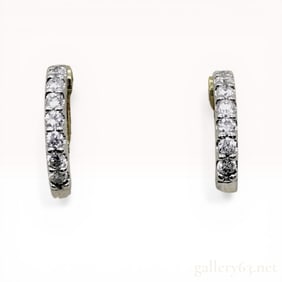 A Pair of Platinum 18K Yellow Gold and Diamond Huggie Hoop Earrings