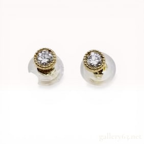 A Pair of Diamond and 18K Yellow Gold Stud Earrings