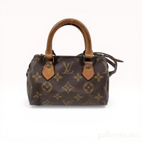 Louis Vuitton Monogram Canvas Mini Speedy Handbag