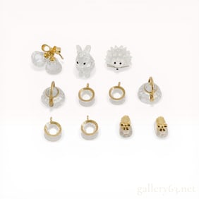 A Collection of Swarovski Faceted Crystal Miniature Figurines and Charms