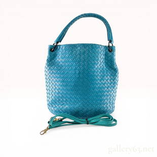 Botttega Veneta, Aquamarine Blue Woven Leather Handbag: Bottega Veneta handbag featuring a turquoise blue intrecciato woven leather exterior and a single braided top handle. Includes a matching detachable shoulder strap, dark gunmetal-toned hardware, and