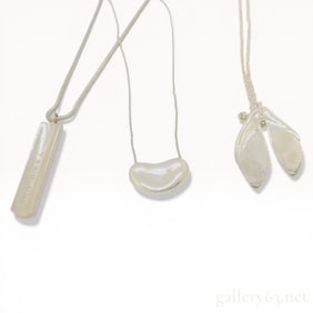 A Trio of Tiffany and Co Sterling Silver Pendant Necklaces