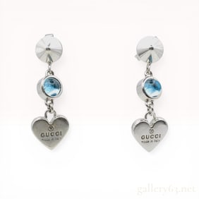 A Pair of Gucci Sterling Silver and Blue Topaz Trademark Heart Drop Earrings