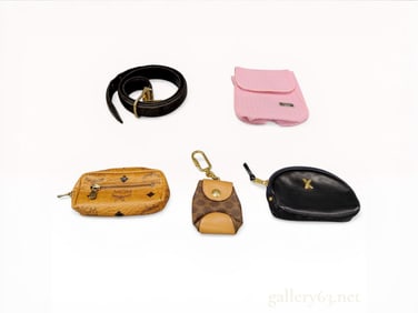 A Collection of Five Vintage Designer Fashion Accessories Including Burberrys, MCM, and Paloma
