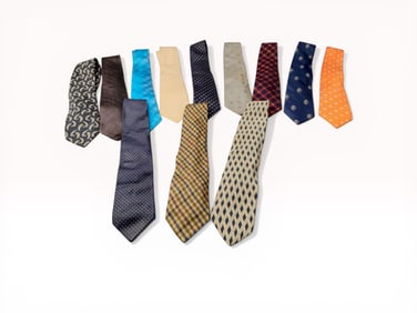 An Assortment of Ten Designer Silk Neckties including Burberry, Gucci, and Balenciaga