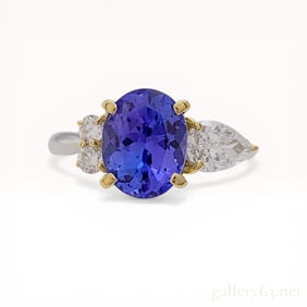 Tanzanite and Diamond Three-Stone Ring in Platinum and 18K Yellow Gold