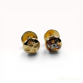 A Pair of Louis Vuitton Monogram Cufflinks