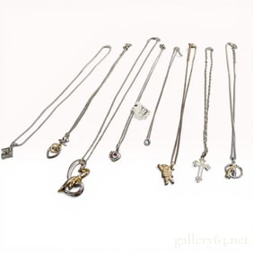 An Assortment of Eight Fashion and Sterling Silver Necklaces Including Lenox and renoma PARIS