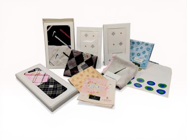 An Assortment of Designer Hand Towels and Handkerchiefs by Givenchy, Balenciaga, and Others