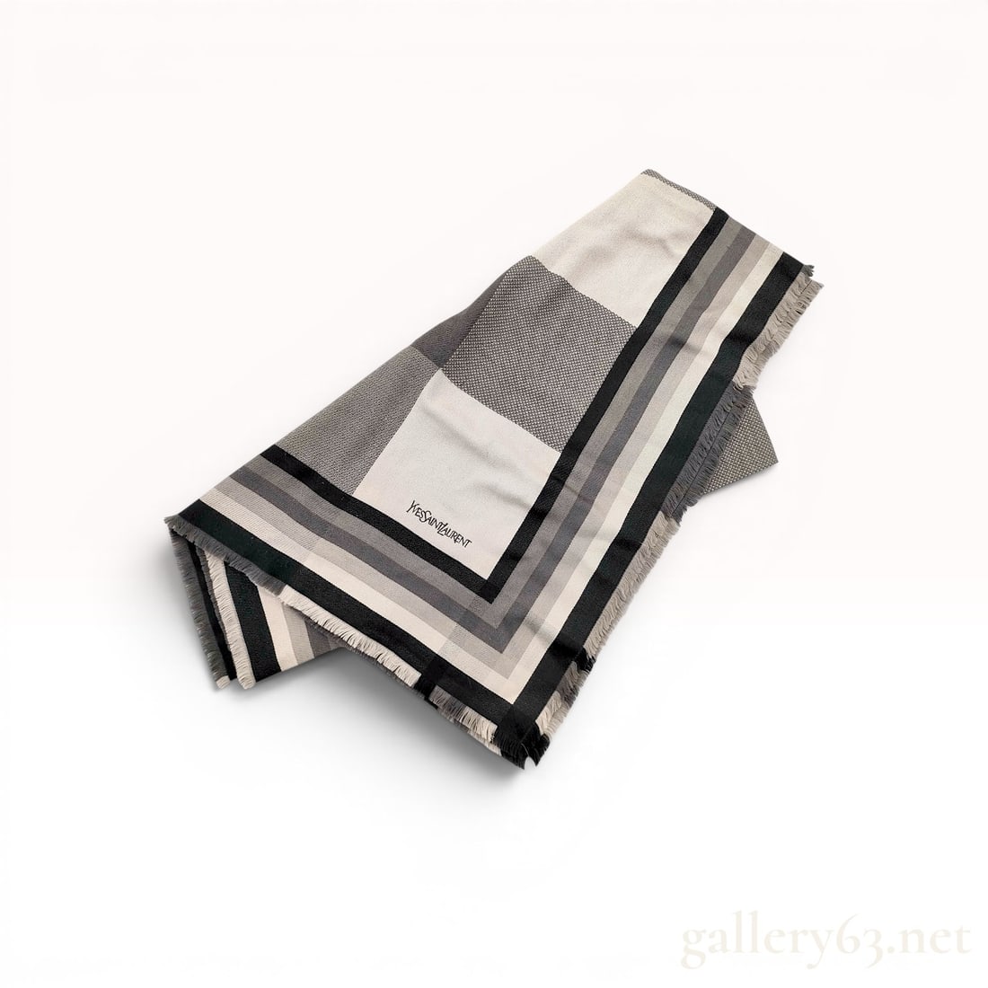 Yves Saint Laurent Wool and Silk Geometric Foulard Scarf: Vintage Yves Saint Laurent foulards collection square scarf, manufactured in Japan under license by Kawabe Co., Ltd. Geometric checkerboard and banded design in a monochrome palette woven from a 60% w