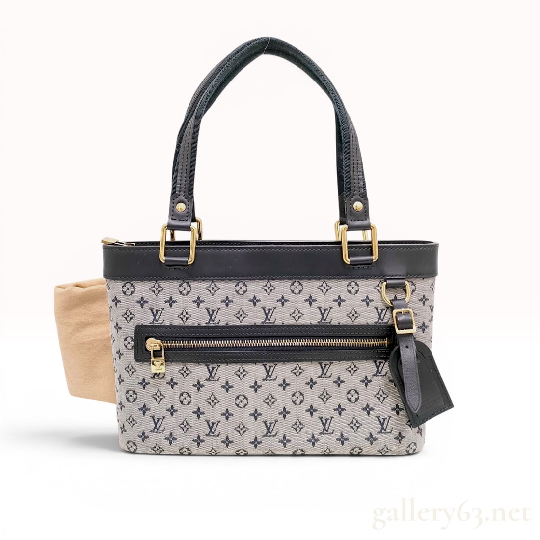 Louis Vuitton Monogram Mini Lin Lucille PM Tote Bag: Louis Vuitton Lucille PM tote bag from the Monogram Mini Lin collection. This bag is constructed from grey and navy blue monogram textile canvas with black leather trim and double flat straps. Feature