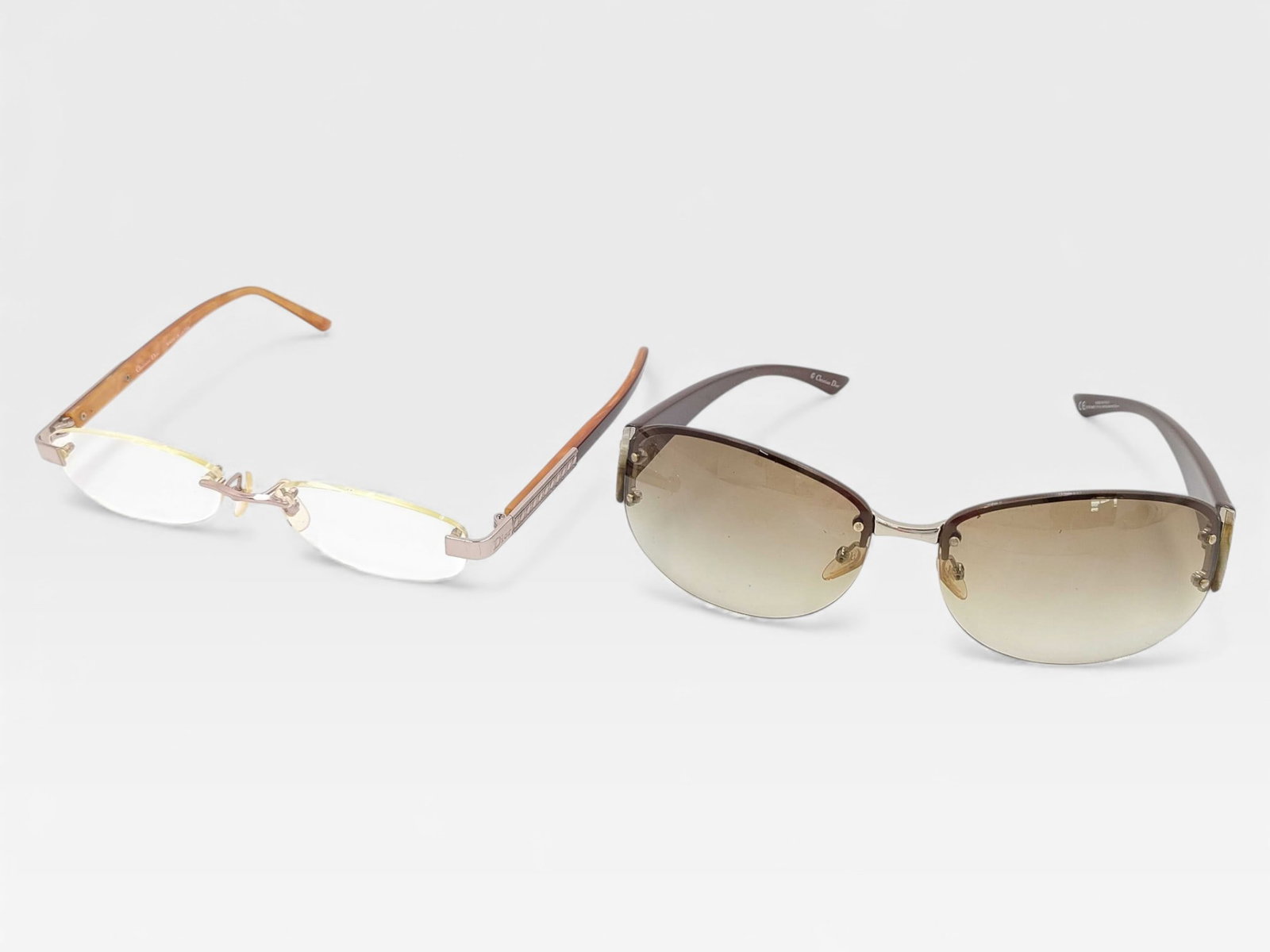 Pair of Dior Sunglasses and Glasses: Authentic vintage Christian Dior sunglasses and regular glasses. You will look good in either of these, can not go wrong with either of these timeless pieces.