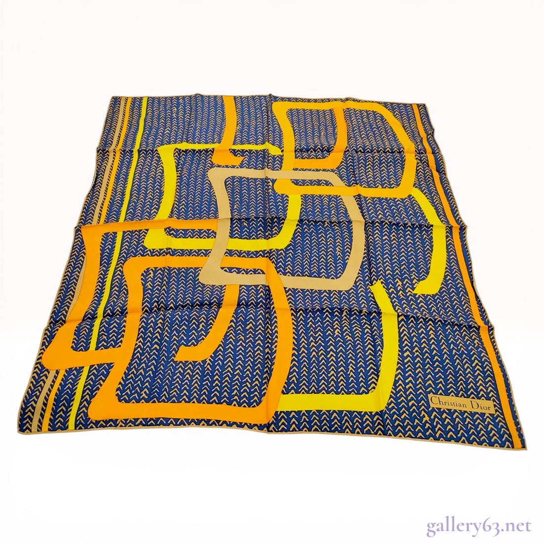 Christian Dior Abstract Geometric Silk Twill Scarf: Christian Dior square silk scarf, mid-to-late 20th century. The design features a bold abstract geometric pattern of interlocking open square frames in yellow, orange, and tan overlaid on a navy blue 