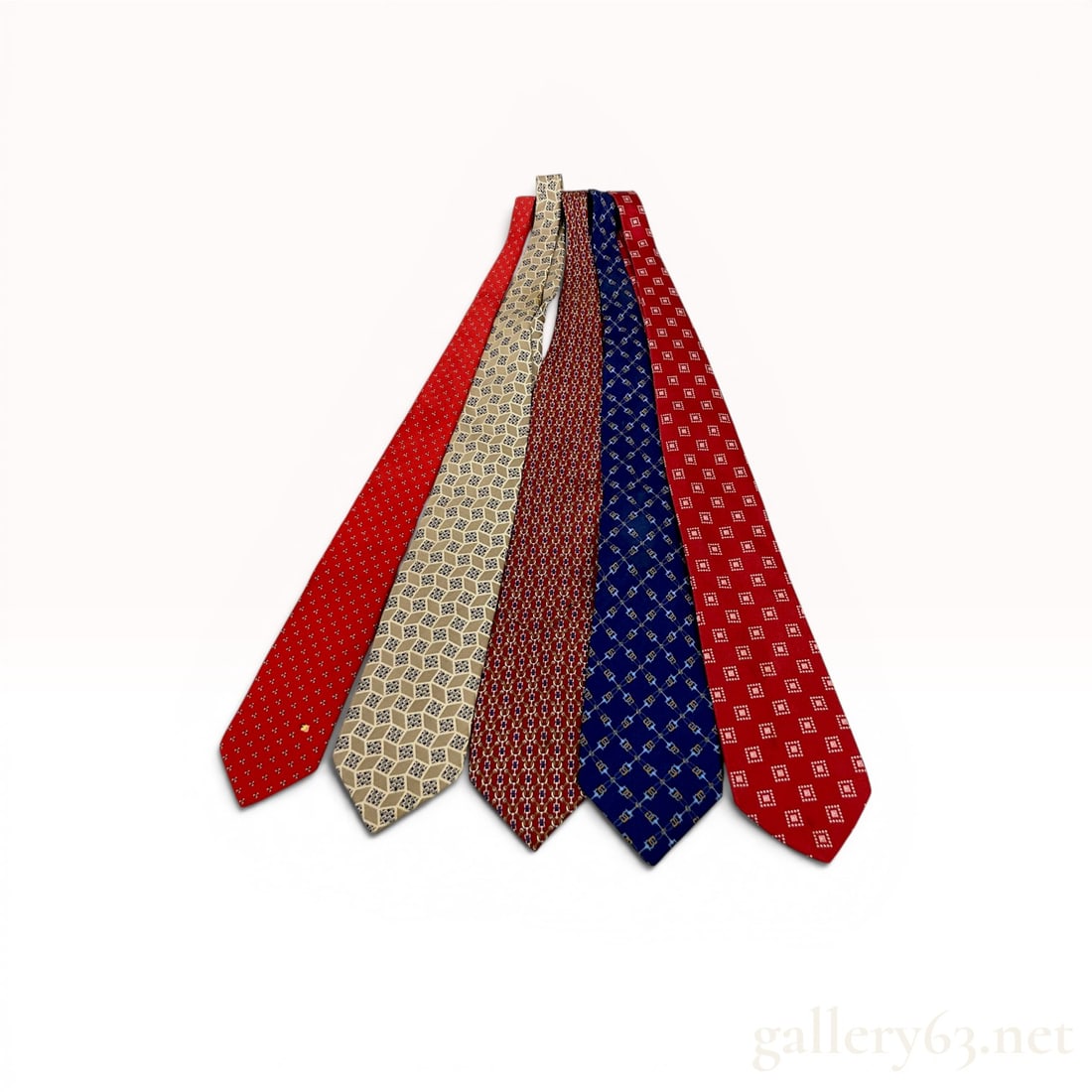 Set of Five Designer Silk Neckties by Fendi and Gianni Versace: Set of five designer silk neckties including four examples by Fendi and one by Gianni Versace, all made in Italy. The collection features various patterns including interlocking chain-links, a 3D rhom