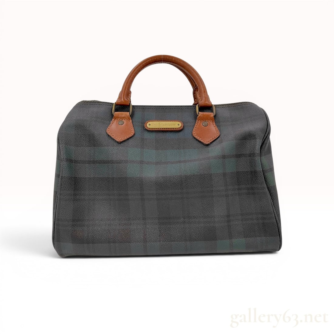 Polo Ralph Lauren Blackwatch Plaid Coated Canvas Boston Bag: Polo Ralph Lauren Boston style satchel featuring a classic green and navy blue Blackwatch plaid pattern. The bag is constructed with a pebbled coated canvas body accented by luggage-tan leather rolled