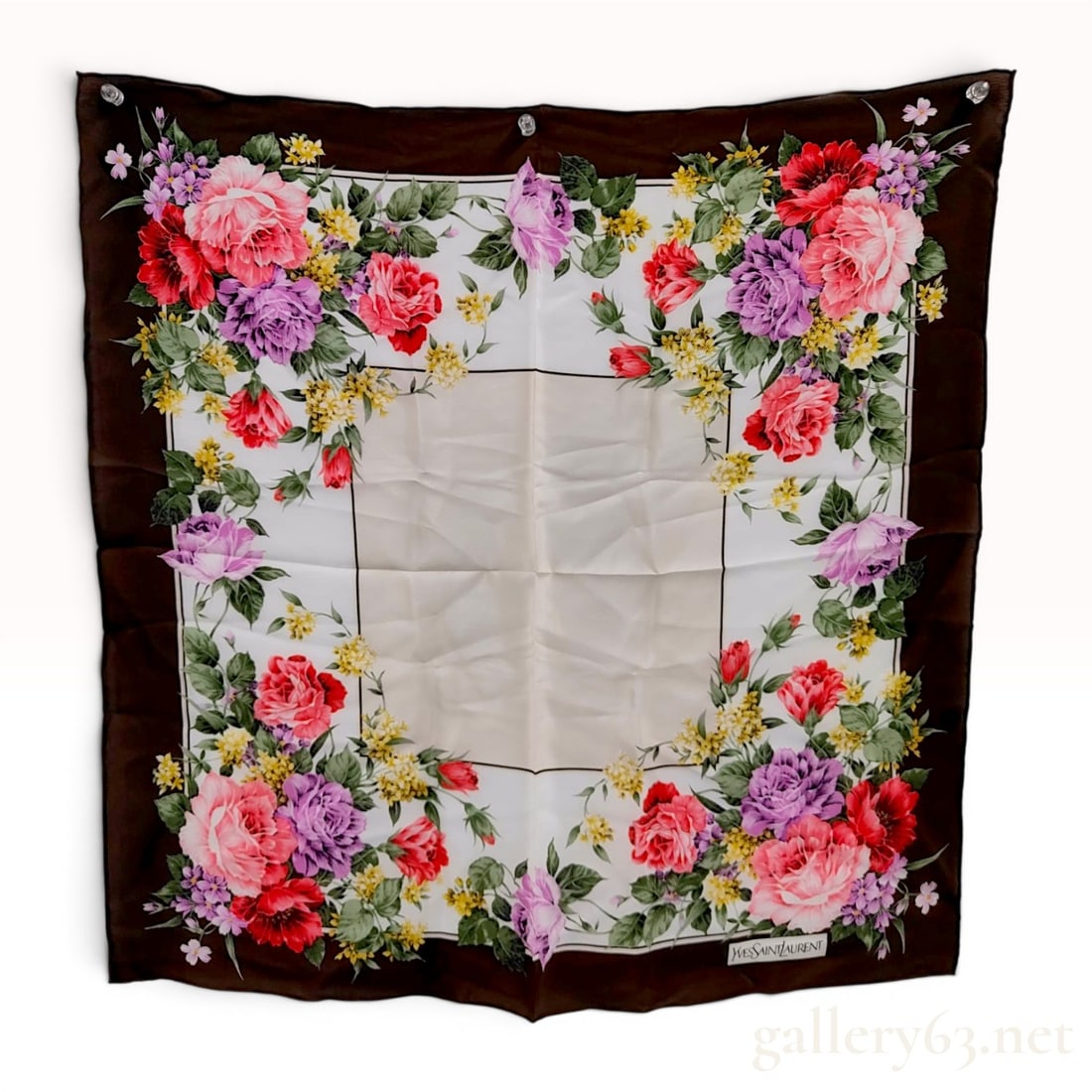 Yves Saint Laurent Vintage Floral Print Silk Foulard Scarf: Vintage Yves Saint Laurent square silk foulard, late 20th century. Features rose bouquets in pink, red, and lavender on a cream center grid with a wide chocolate brown border. Includes printed designe