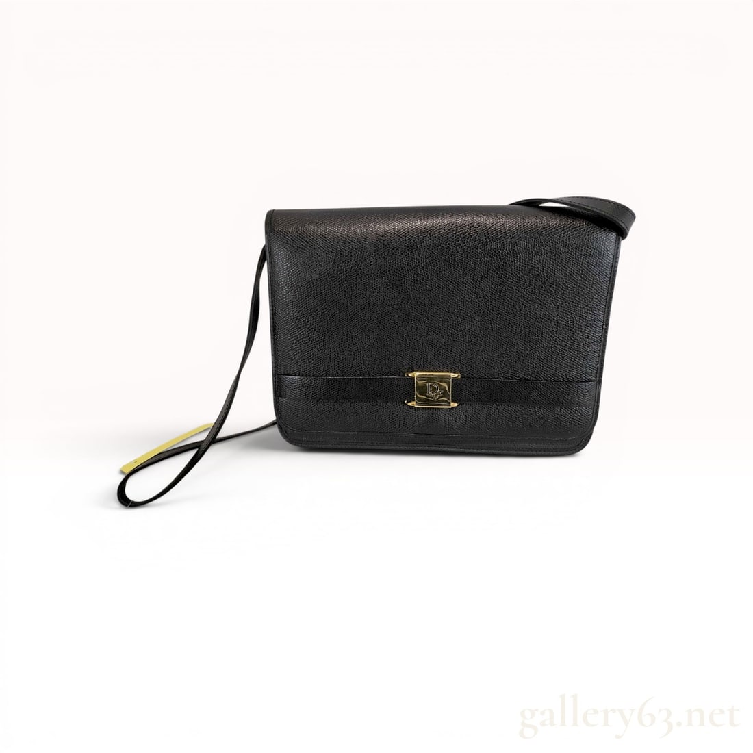 Christian Dior Vintage Black Grained Leather Flap Shoulder Bag: Vintage Christian Dior shoulder bag in black grained leather with gold-tone hardware. The structured rectangular silhouette features a front flap with a decorative horizontal band and a Dior logo plaq