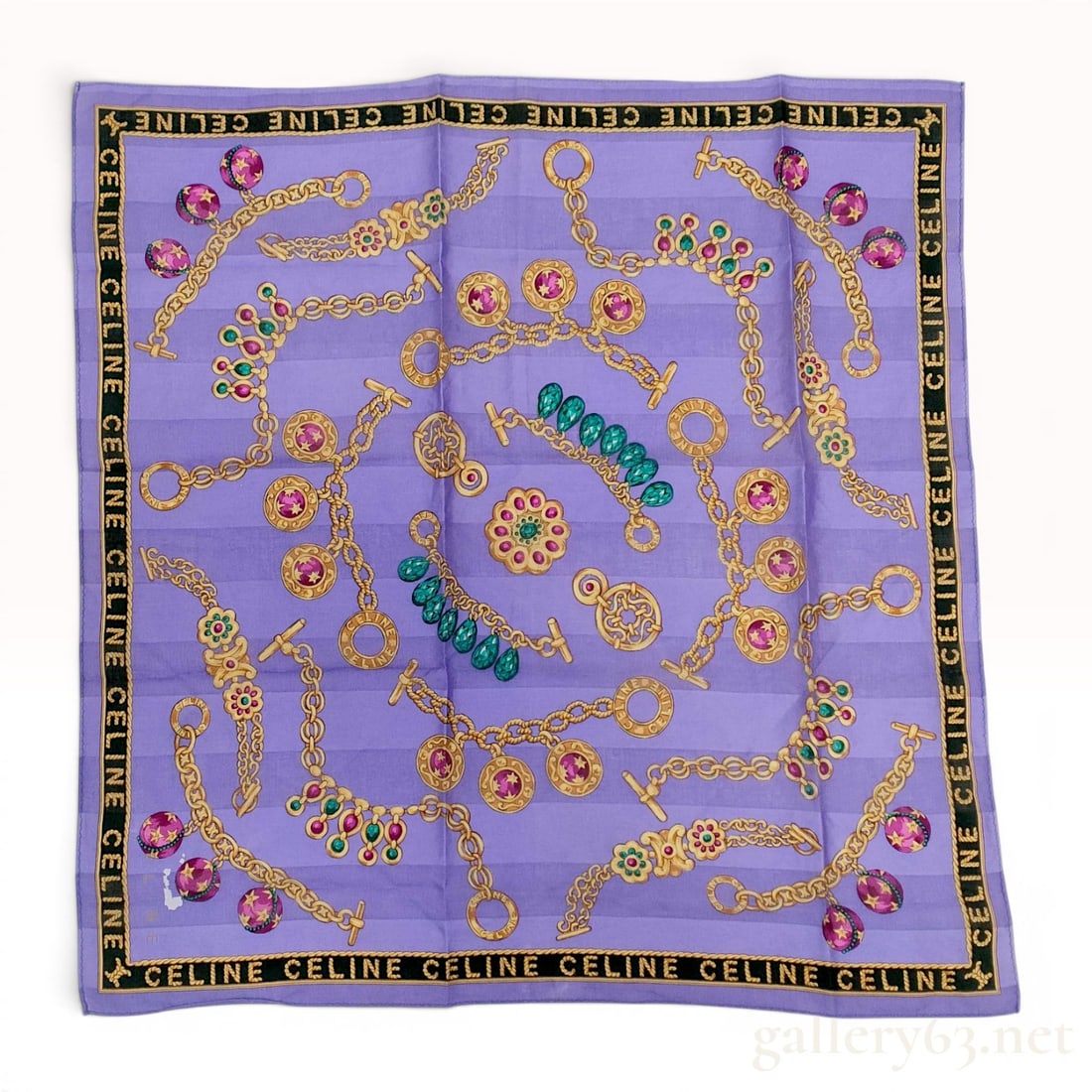 Celine Silk Jewelry Motif Scarf: Celine square silk scarf featuring an ornate jewelry-themed design, late 20th century. The lavender field with tonal horizontal stripes displays gold-toned chain links, charms, and gemstones in emeral