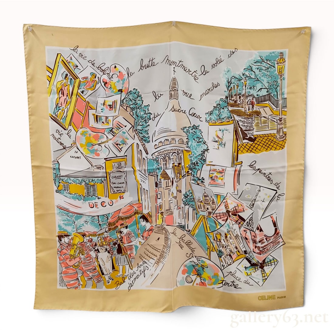 Vintage Celine Silk Scarf with Montmartre Paris Motif: Vintage Celine silk scarf featuring a multi-colored illustrative print of the Montmartre district in Paris. The composition depicts the Sacre-Coeur Basilica, street musicians, and artists' vignettes w