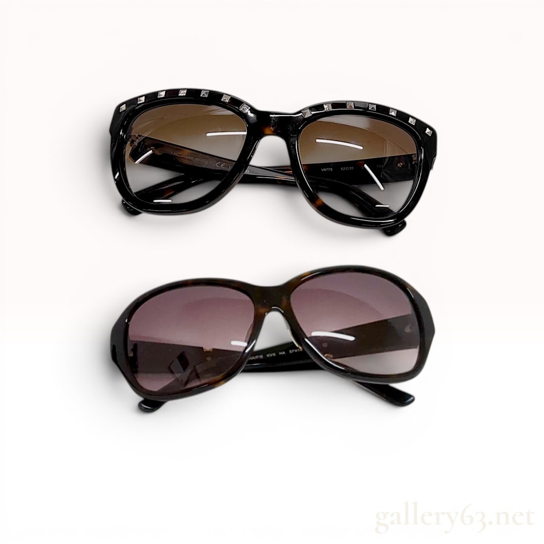 Two Pairs of Designer Sunglasses including Valentino Studded and Vintage Bausch & Lomb Ray-Ban: Two pairs of designer sunglasses including a modern Valentino V677S model and vintage Bausch & Lomb Ray-Ban Wayfarer II. The Valentino pair features dark tortoiseshell acetate frames accented with sil