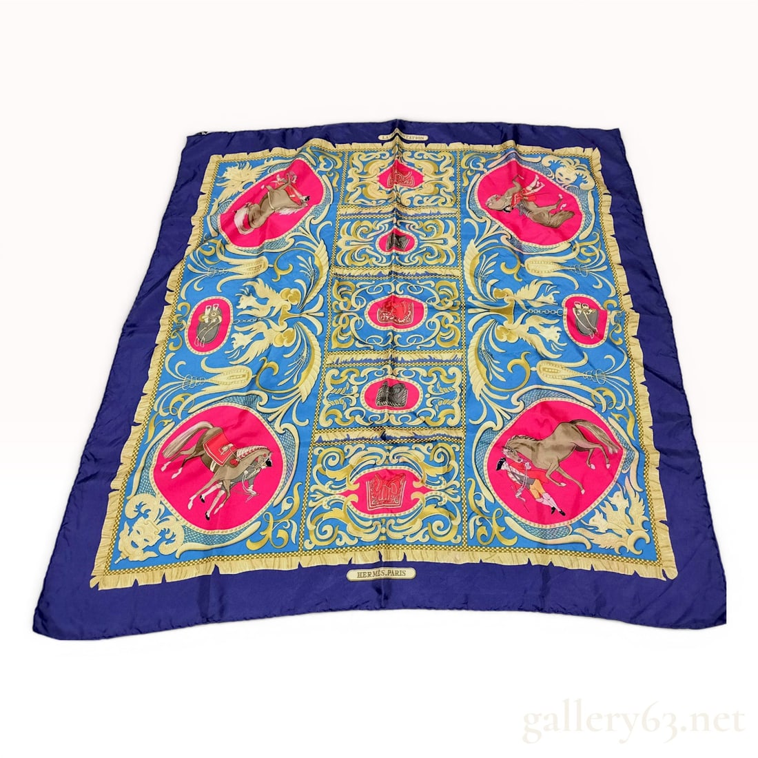 Hermes La Presentation Silk Scarf Designed by Philippe Ledoux: Hermès silk twill Carré 90 scarf in the La Présentation pattern, designed by Philippe Ledoux and first issued in 1970. The equestrian-themed composition features ornate gold scrol