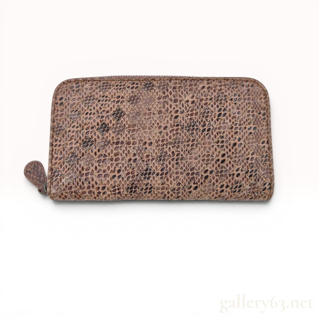 Bottega Veneta Intrecciato Python Zip-Around Wallet: Bottega Veneta zip-around wallet featuring an intrecciato woven genuine python skin exterior in shades of tan and brown with gunmetal-tone hardware. The smooth mauve leather interior contains eight ca