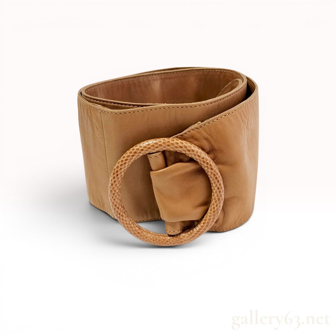 Gucci Vintage Wide Tan Leather Cinch Belt with Exotic Skin Buckle: Gucci vintage wide tan leather cinch belt, late 20th century. Constructed from cognac-toned leather with tonal stitching and a large circular buckle covered in exotic lizard or snakeskin. The interior