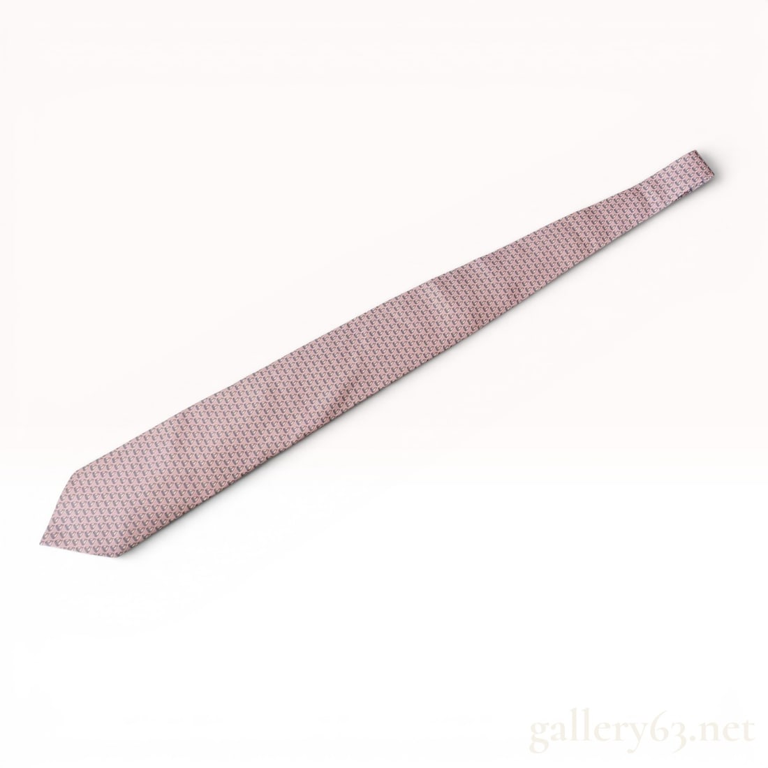 Hermes Pink Silk Sailboat Motif Necktie: Herm?¨s silk necktie featuring a repeating pattern of small-scale sailboats in white and blue on a light pink ground. Constructed from 100% silk, the item includes a woven keeper loop and a printed H