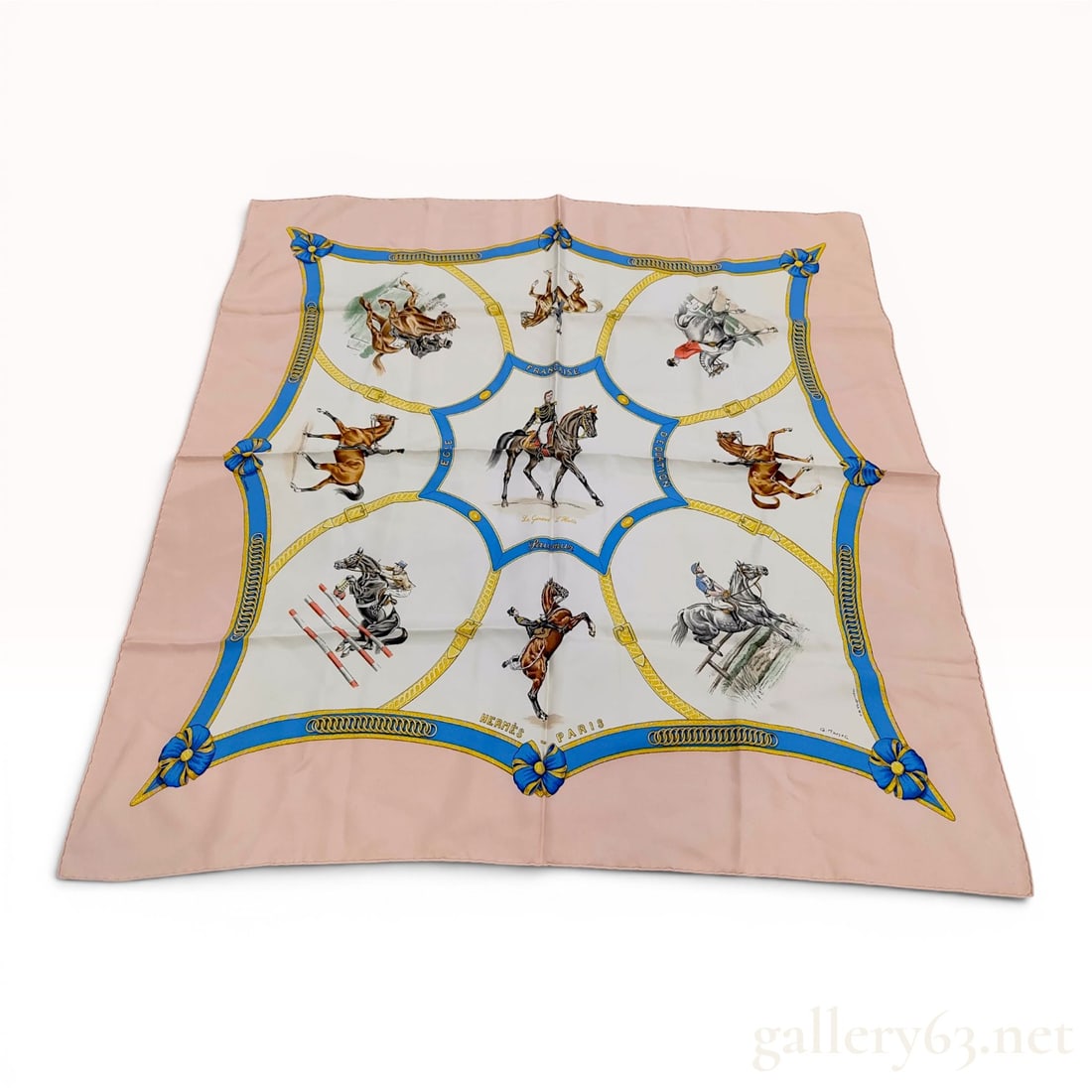 Hermes Ecole Francaise d'Equitation Silk Scarf by Genevieve Hanoc: Hermès silk carré in the Ecole Française d'Equitation pattern, designed by Geneviève Hanoc. The screen-printed design depicts General L'Hotte on horseback surrounded by vig