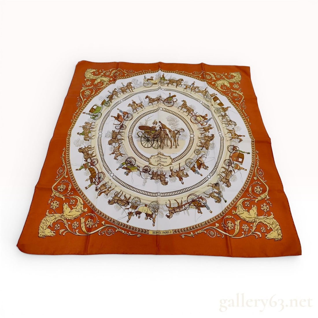 Hermes La Promenade de Longchamps Silk Scarf by Philippe Ledoux w/Box: This Hermès silk twill scarf features the La Promenade de Longchamps pattern designed by artist Philippe Ledoux. The central circular composition illustrates a variety of nineteenth-century hor
