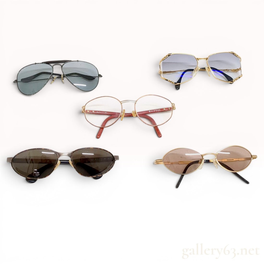 An Assortment of Designer Sunglasses and Eyeglasses Including Ray-Ban, Christian Dior, and Cazal: An assortment of designer sunglasses and eyeglasses featuring makers Ray-Ban, Christian Dior, Cazal, and Katharine Hamnett, circa 1980s-1990s. The collection includes aviator, oversized geometric, and