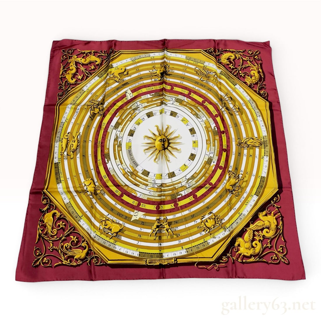 Hermes Dies et Hore Silk Scarf Designed by Francoise Faconnet: A vintage Hermès silk carré scarf featuring the Dies et Hore pattern, also known as Astrologie, designed by artist Françoise Faconnet and first issued in 1963. The central design 