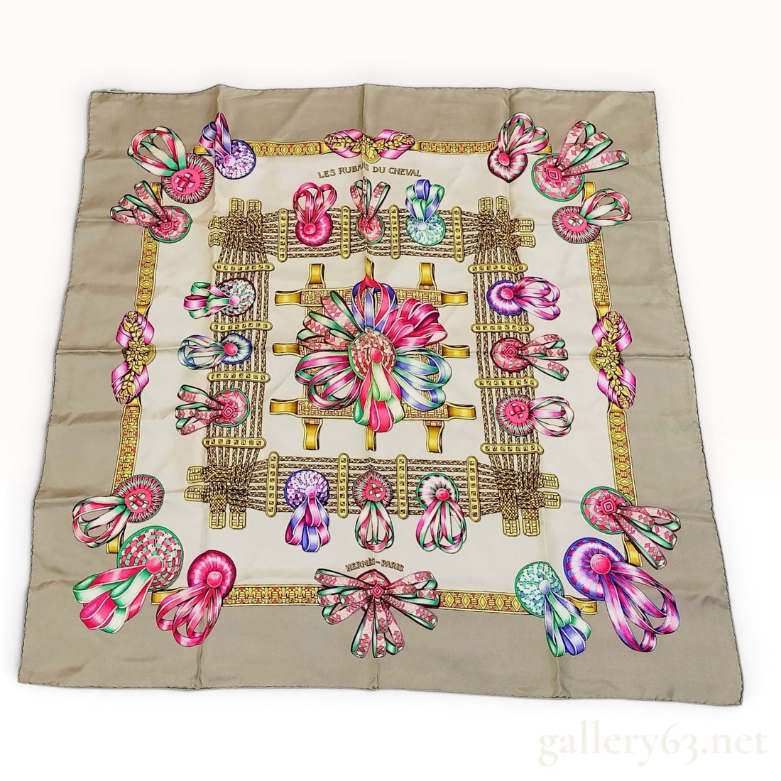 Hermes Silk Scarf Les Rubans du Cheval by Joachim Abadie: An Hermès silk carré scarf titled Les Rubans du Cheval, designed by artist Joachim Abadie and first issued in 1993. The pattern displays various intricate equestrian prize ribbons and ro