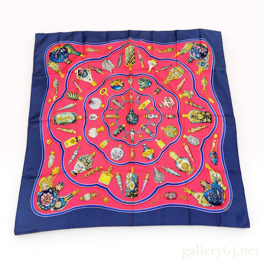 Hermes Qu'importe le Flacon Silk Scarf: Hermès square silk scarf featuring the Qu'importe le Flacon design by artist Catherine Baschet. The pattern illustrates a diverse collection of ornate perfume bottles and flacons in various his
