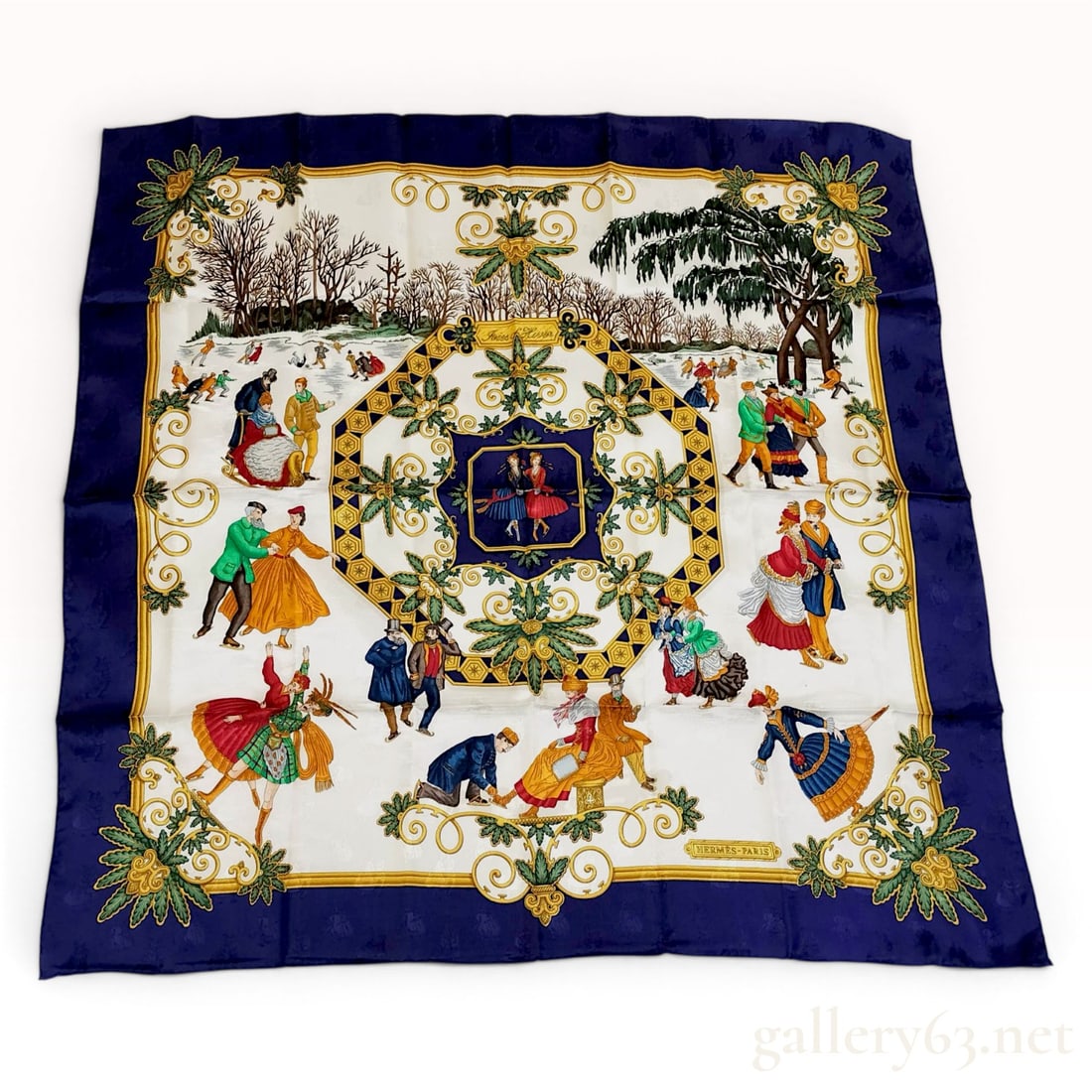Hermes Paris Joies d'Hiver 90cm Silk Jacquard Scarf: This Hermès Paris silk scarf, titled Joies d'Hiver (Winter Joys), is a 90cm square scarf featuring a damasse or jacquard weave. The pattern illustrates nineteenth-century figures ice skating in