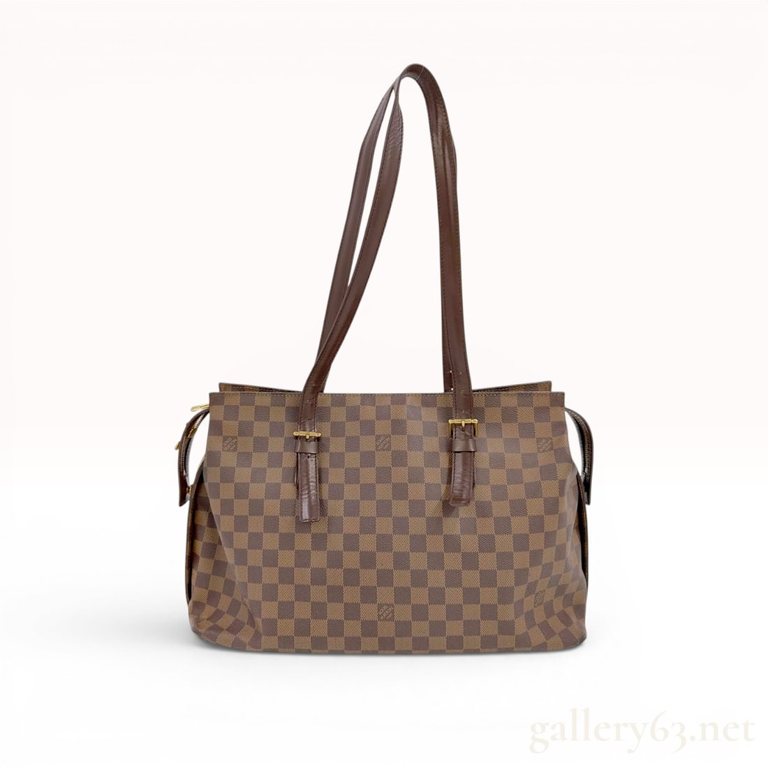 Louis Vuitton Damier Ebene Chelsea Shoulder Bag: A Louis Vuitton Chelsea shoulder bag crafted in Damier Ebene coated canvas with dark brown leather trim and base. The tote design features two adjustable dark brown leather shoulder straps that are se