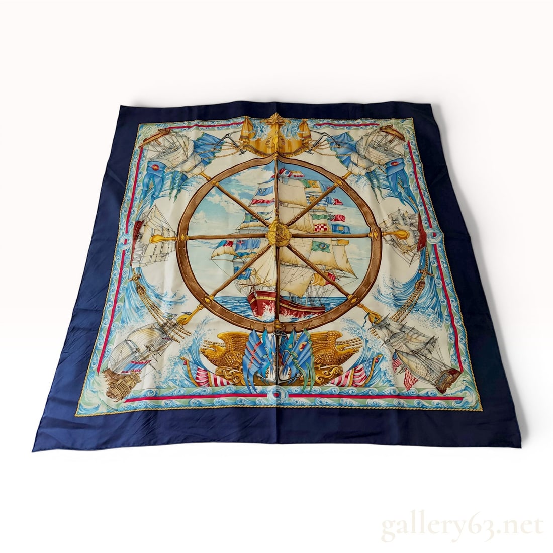 Hermes Vive le Vent Silk Scarf designed by Laurence Thioume: Hermès silk twill scarf in the Vive le vent pattern, designed by artist Laurence Thioume. The nautical composition features a central ship steering wheel surrounded by colorful maritime flags a