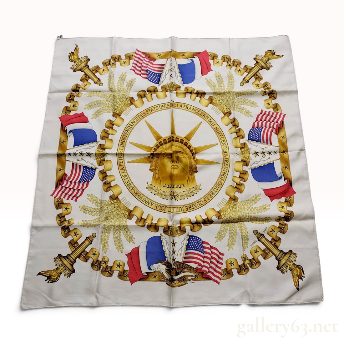 Hermes Liberty Pattern Silk Scarf by Joachim Metz: Hermès silk Carré 90 scarf in the Liberty pattern designed by Joachim Metz, originally issued in 1984 to commemorate the centenary of the Statue of Liberty. The central design features t