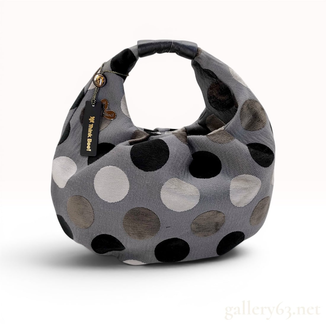 Think Bee! Arles Pattern Slouchy Polka Dot Tote Bag: Think Bee! Arles pattern slouchy hobo-style tote bag. The exterior is crafted from gray woven jacquard fabric featuring large, textured chenille-like polka dots in black, white, and taupe, finished wi