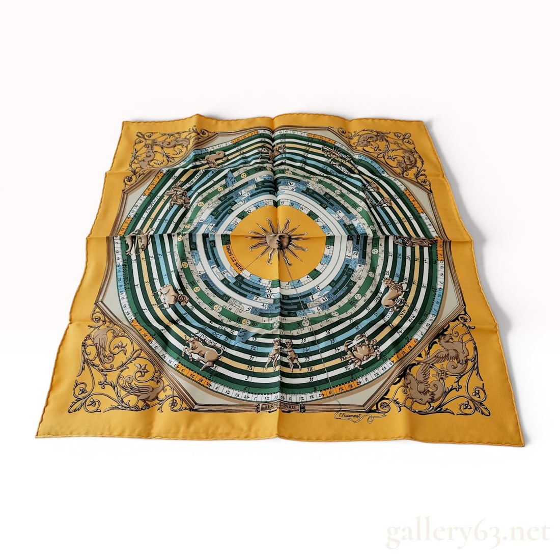 Hermes Astrologie Dies et Hore Silk Gavroche Pocket Square: Hermès 100 percent silk pocket square in the Dies et Hore pattern, designed by Françoise Faconnet, late 20th century. The astrological design features a central sun face and concentric z