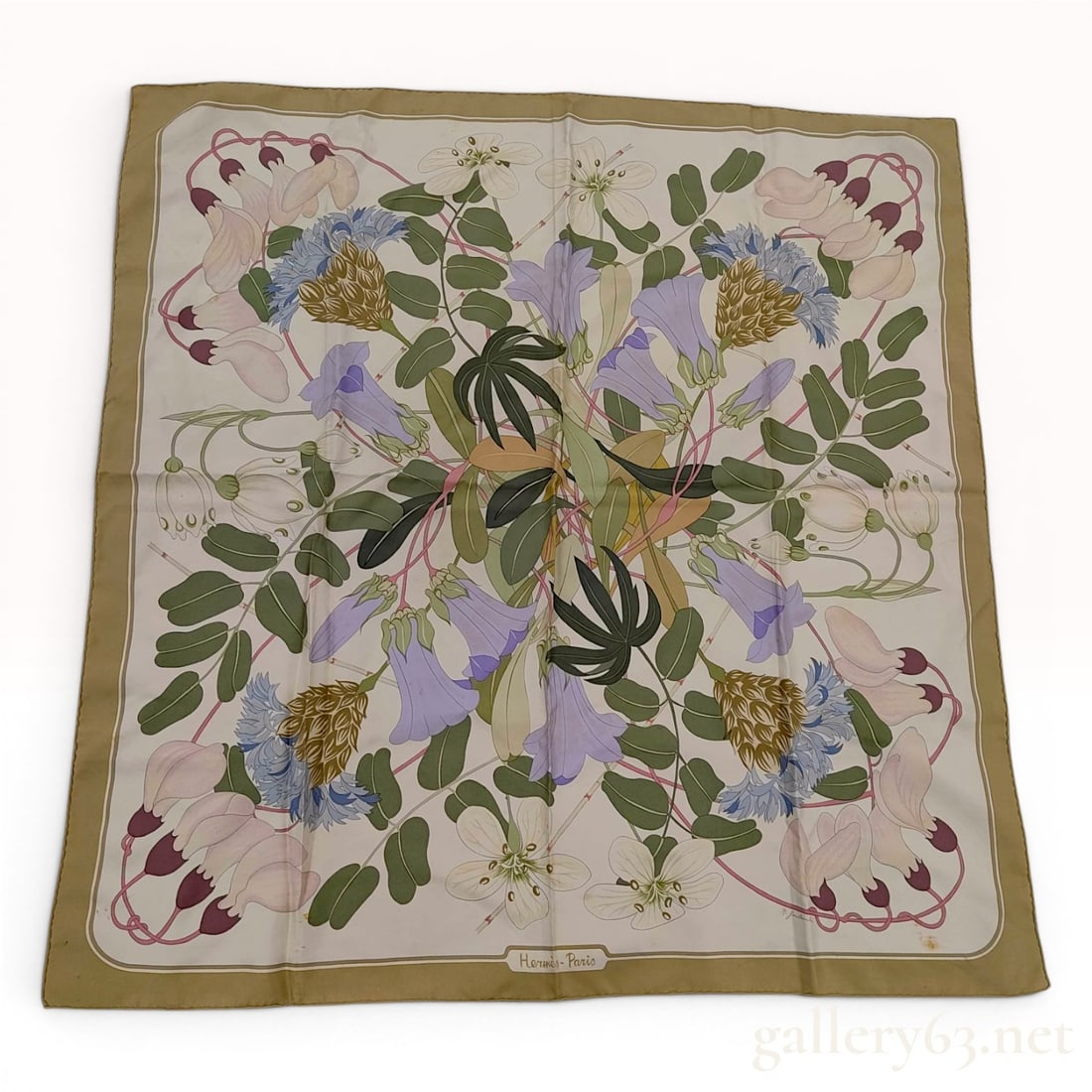 Hermes Flora Graeca Silk Scarf designed by Niki Goulandris: This Hermès silk scarf features the Flora Graeca pattern designed by artist Niki Goulandris. The botanical design depicts a central arrangement of Mediterranean wildflowers, including lavender 