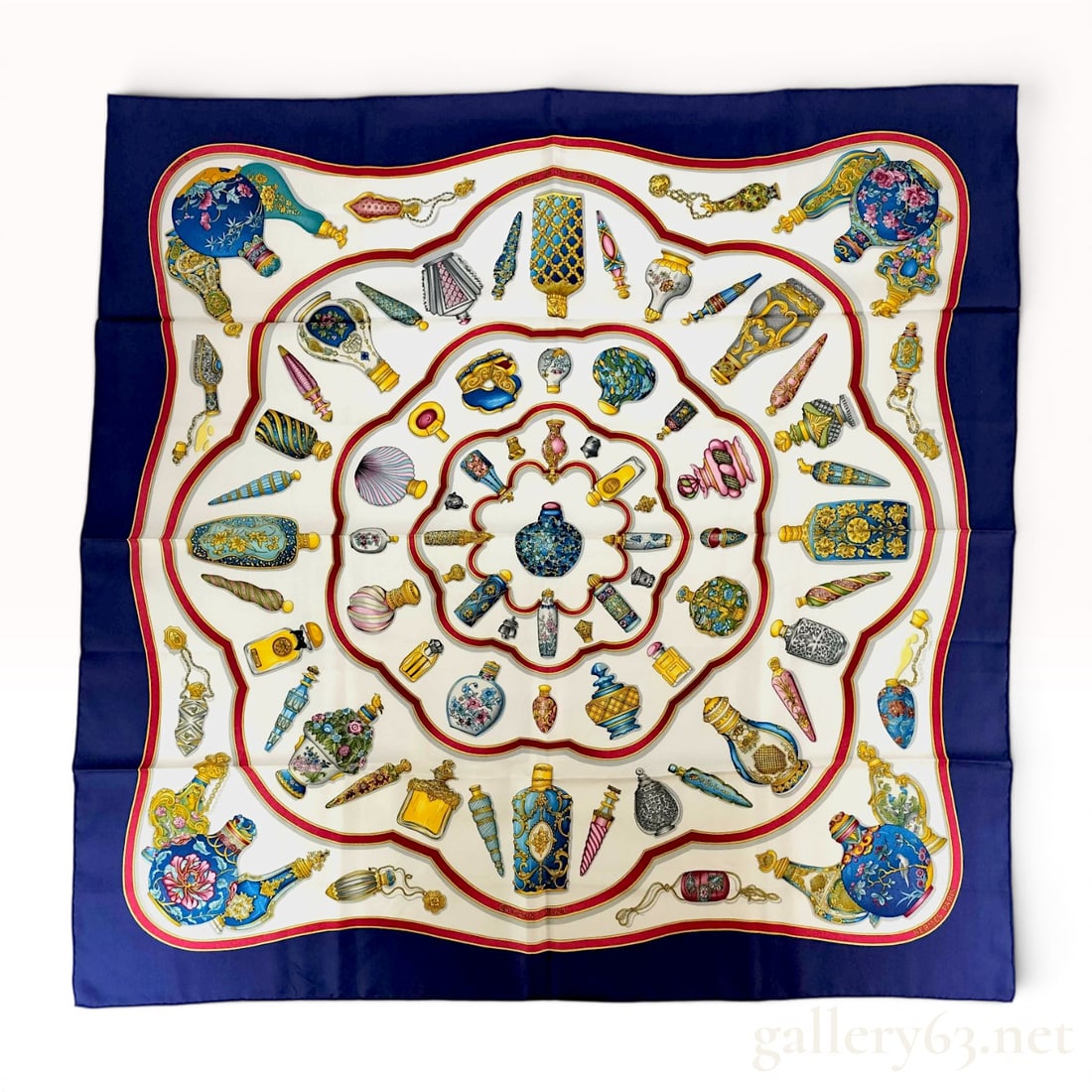 Hermes Qu'importe le flacon Silk Scarf: Hermès silk scarf in the Qu'importe le flacon (Perfume Bottles) pattern, designed by Catherine Baschet and first issued in 1988. The design features various antique perfume bottles in concentri