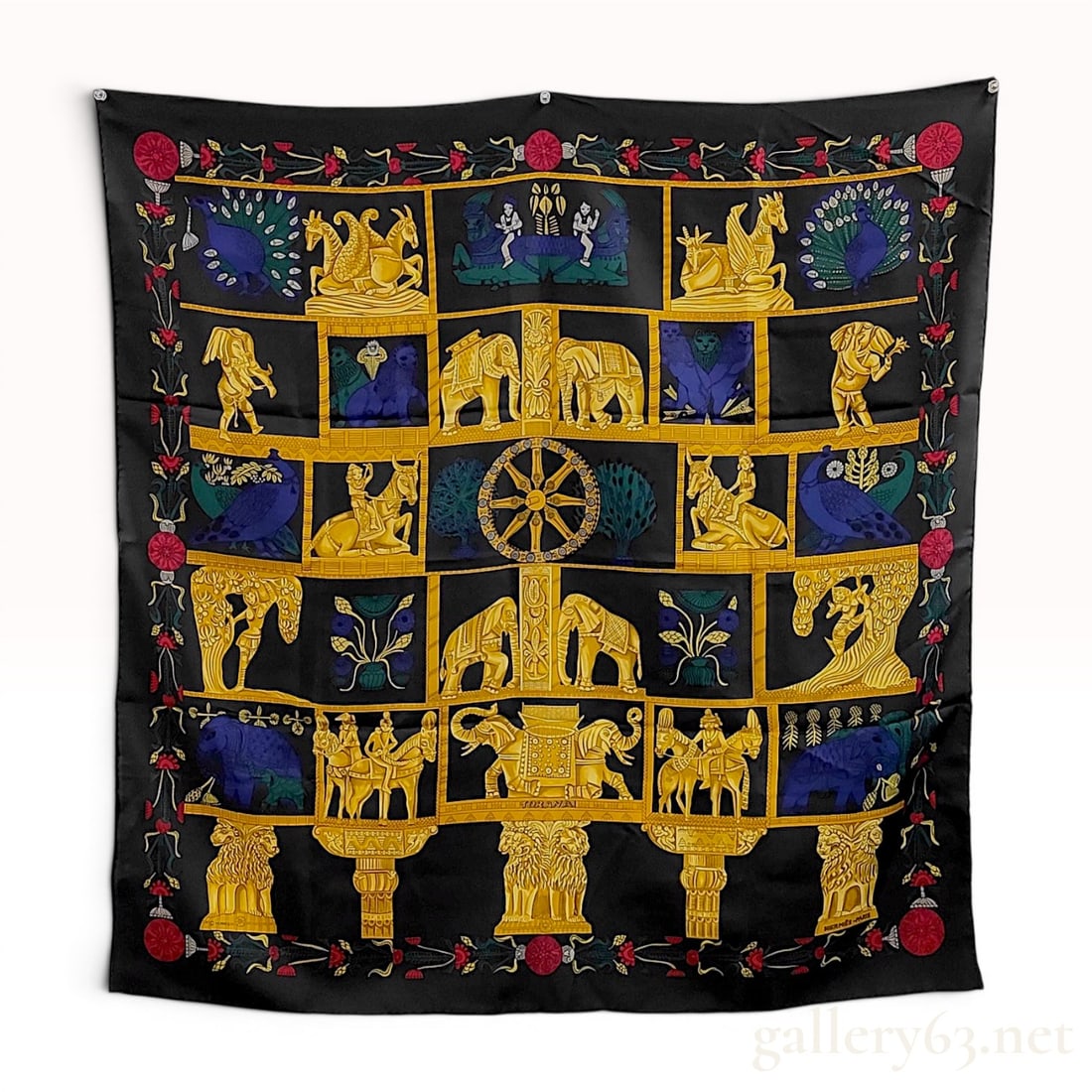 Hermes Torana Silk Twill Scarf: Hermès silk twill scarf in the Torana pattern designed by Annie Faivre, first issued in 1987. The design features gold architectural motifs of Indian Buddhist gateways with elephants, lions, an