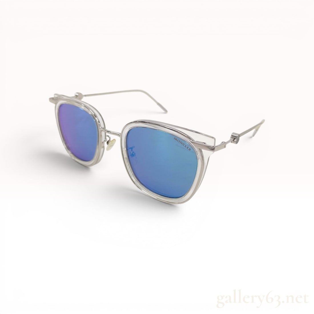 Moncler Clear Acetate and Silver-Tone Metal Sunglasses: Moncler square-frame sunglasses featuring a hybrid construction of clear acetate outer rims over slim silver-tone metal inner frames. The blue-mirrored lenses are paired with matching silver-tone meta