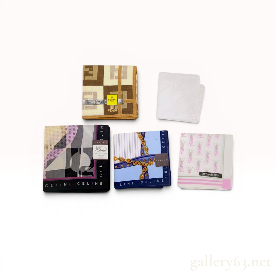 A Group of Five Designer Pocket Squares by Fendi, Celine, and Yves Saint Laurent: A group of five designer pocket squares featuring examples by Fendi, Celine, and Yves Saint Laurent. The Fendi piece is cotton with a large-scale Zucca monogram and belt graphic, while the Celine item
