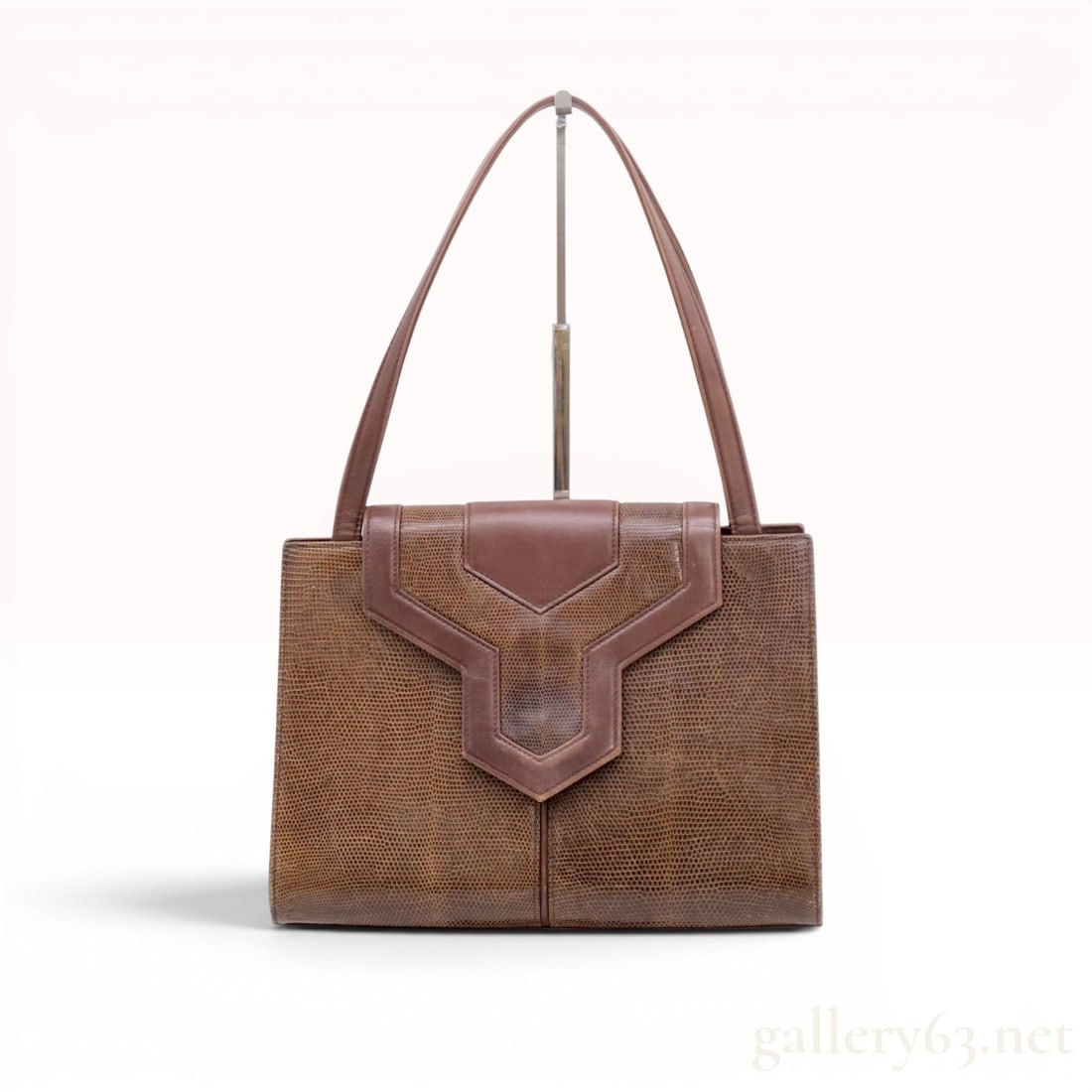 Yves Saint Laurent Vintage Brown Lizard Leather Shoulder Bag: Yves Saint Laurent vintage structured shoulder bag featuring a mid-century silhouette and the brand signature Y-shaped design. The exterior is crafted from brown genuine lizard skin, accented with a s
