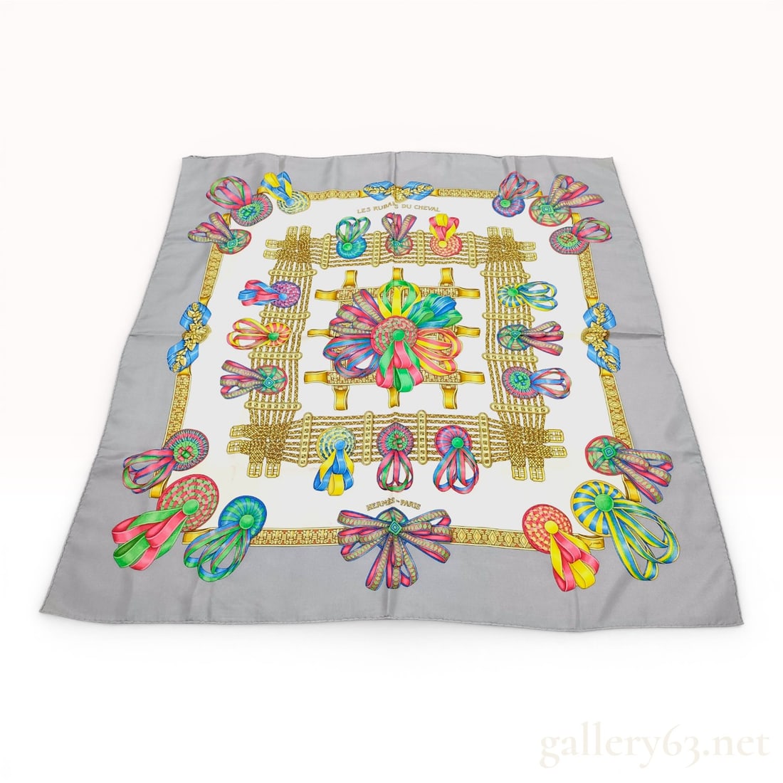Hermes Les Rubans du Cheval Silk Scarf: A vintage Hermès 90cm silk twill scarf in the Les Rubans du Cheval (The Horse's Ribbons) pattern, designed by Joachim Abadie and first issued in 1988. The design features an array of colorful p
