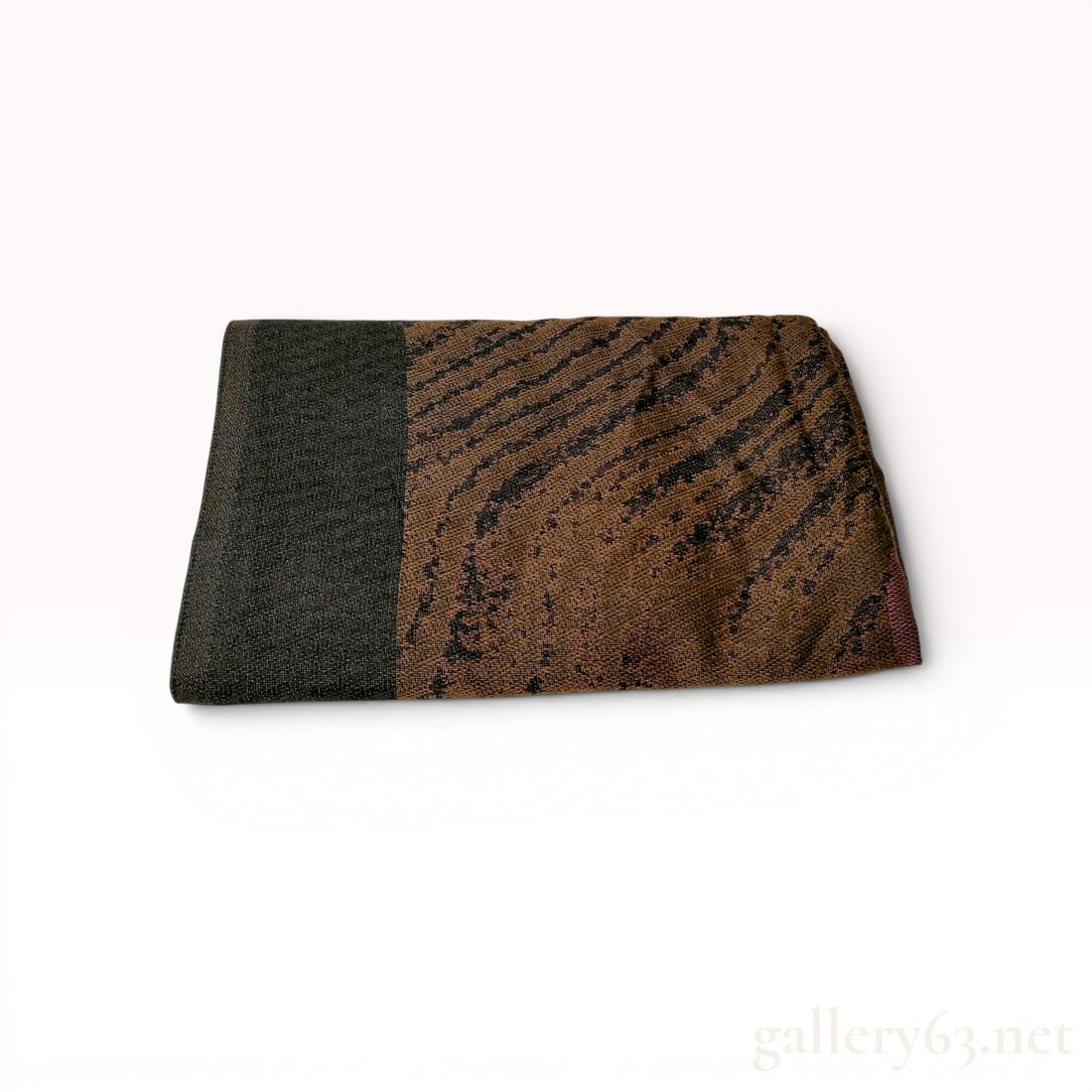 Jean Paul Gaultier Jacquard Woven Oversized Stole: Jean Paul Gaultier jacquard woven oversized stole featuring an abstract wavy pattern reminiscent of woodgrain or animal print. The textile is woven in shades of charcoal, chocolate brown, and tan with
