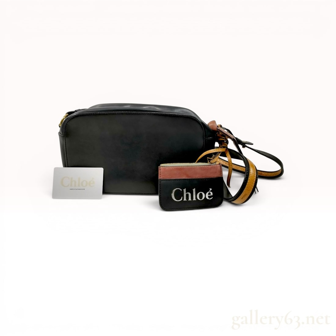 Chloe Sam Leather Shoulder Bag and Detachable Pouch: Chloe Sam leather shoulder bag and coordinating detachable pouch. Construction features smooth black leather with contrasting tan and brown leather accents and gold-tone metal hardware. The adjustable